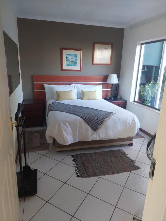Sleep Eezy Cottages เบโนนิ ภายนอก รูปภาพ