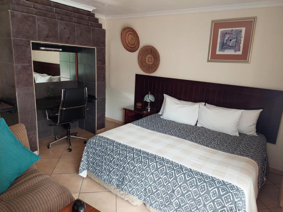 Sleep Eezy Cottages เบโนนิ ภายนอก รูปภาพ
