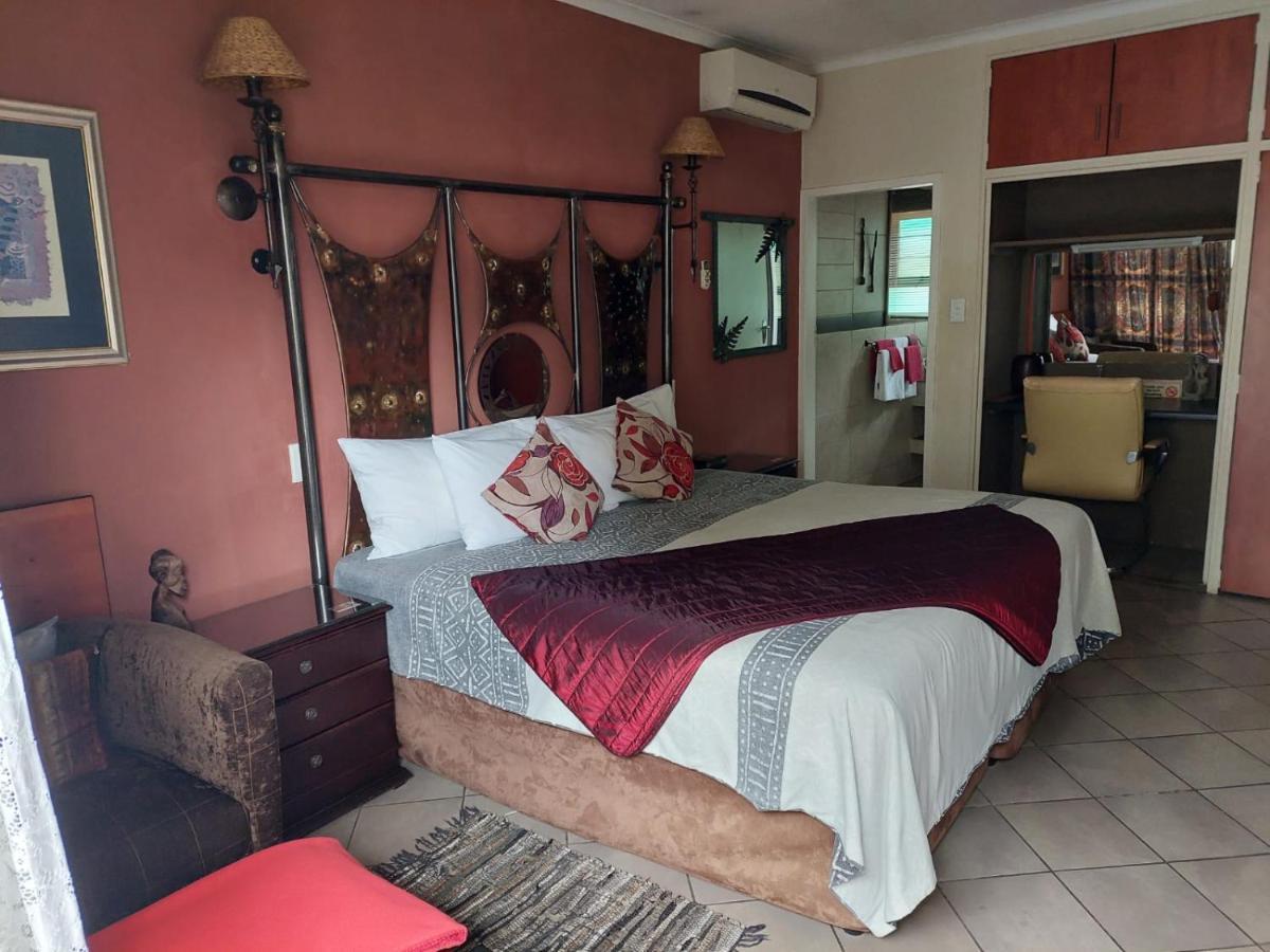 Sleep Eezy Cottages เบโนนิ ภายนอก รูปภาพ