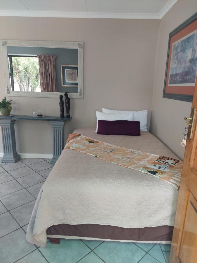 Sleep Eezy Cottages เบโนนิ ภายนอก รูปภาพ
