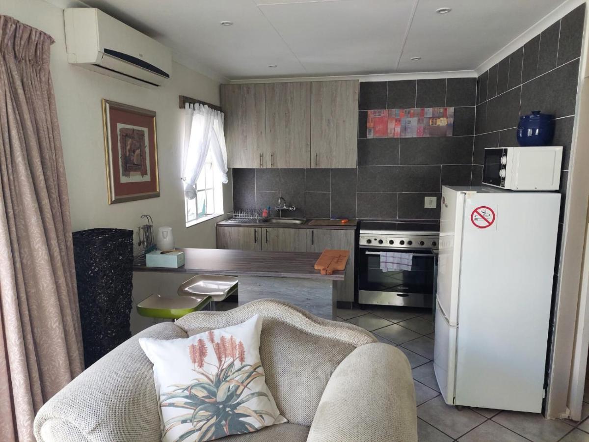 Sleep Eezy Cottages เบโนนิ ภายนอก รูปภาพ